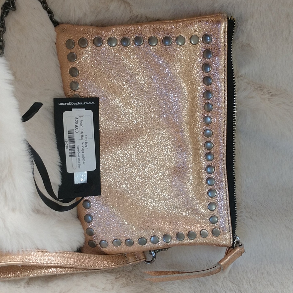 Clutch handbag with long strap